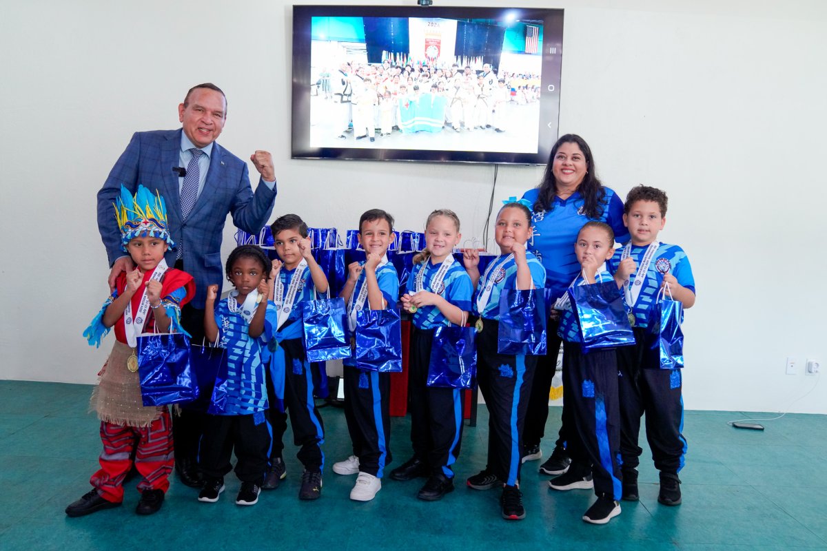 team celebrates winning 50 medals