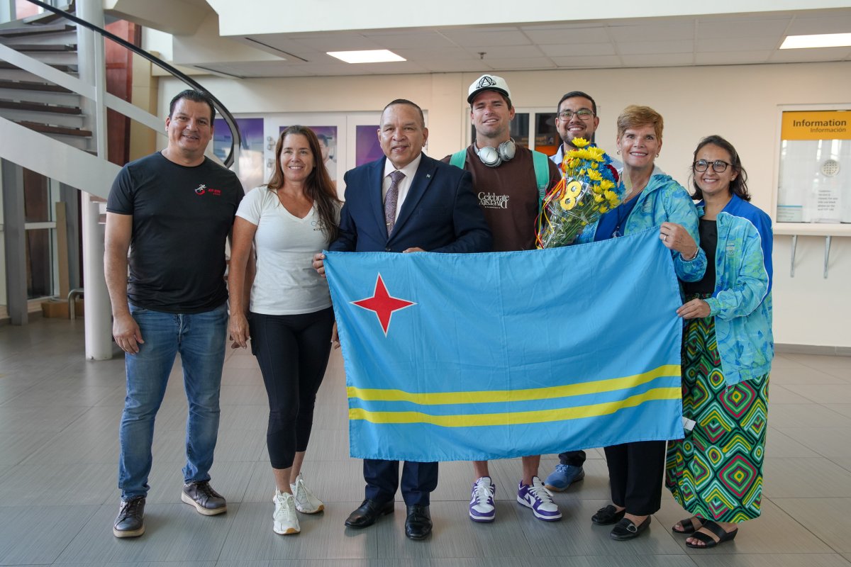 Ethan Westera welcomed at the airport after finishing eighth in Olympic windsurfing at Paris