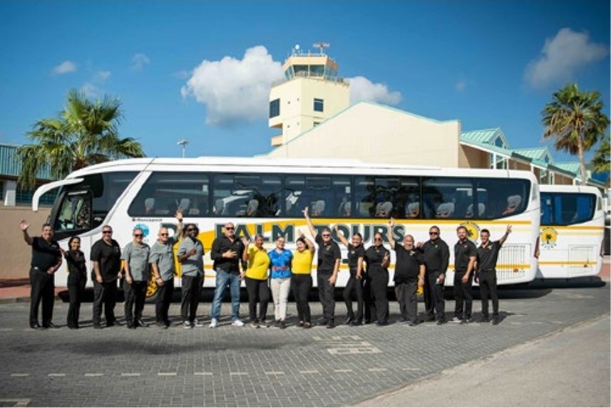 De Palm Tours team assisting travelers during Aruba Airport closure