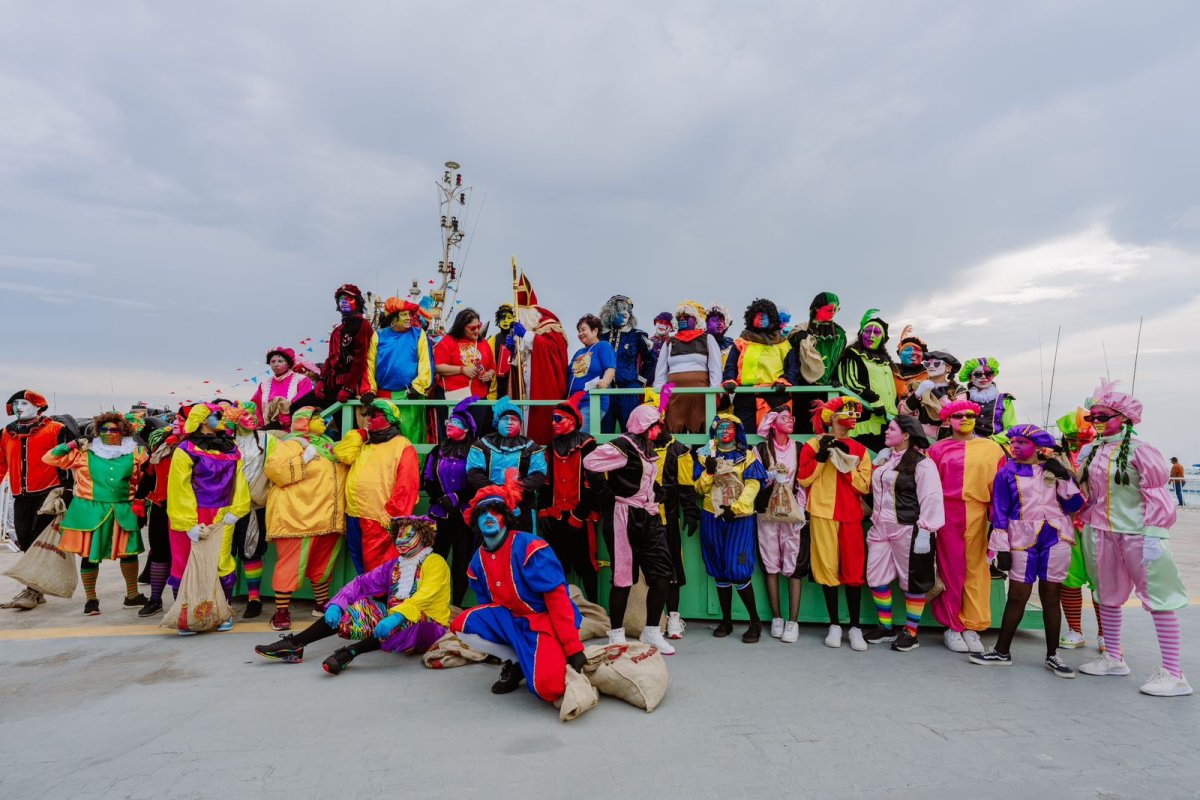 Sint and Piet groups at the arrival of Sinterklaas celebration in Aruba