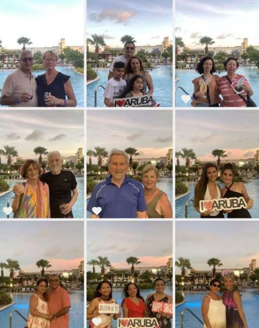 Guests savoring fine wines at Radisson Blu Aruba's Wine Down Happy Hour