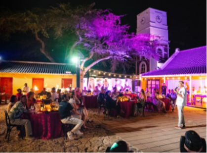 Visitors exploring Aruba’s rich culture and local art galleries.