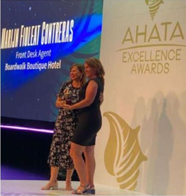 Marijn Fiolet Contreras receiving AHATA Award of Excellence