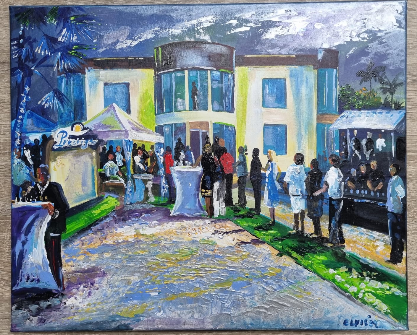 Attendees enjoying live music by OREO during Prestige Vacations Aruba’s 25th-anniversary celebration.