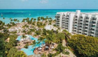 Guests enjoying the New Year’s Eve celebration with fireworks at Aruba Marriott Resort.