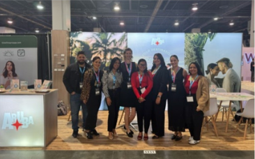 Aruba representatives interacting with wedding planners at Wedding MBA 2024 in Las Vegas