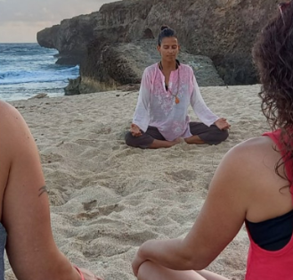 Sunrise meditation on a secluded beach in Aruba