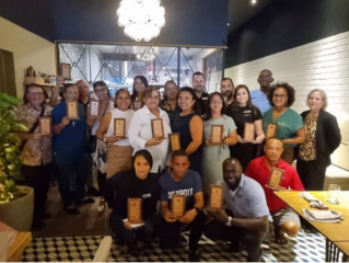 Playa Linda Beach Resort employees celebrating milestone anniversaries at a special Thanksgiving event