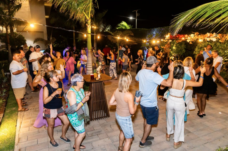 Guests enjoying tropical cocktails