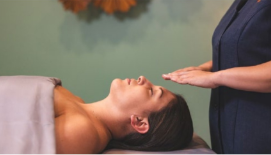 A serene treatment room at ZoiA Spa featuring acoustic and vibrational therapy.