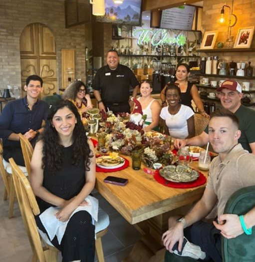 Guests enjoy a delicious dinner at Papiamento during the Choice Upscale Press Trip