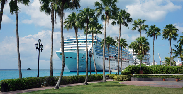 Cruise ship docked at Aruba Port in February 2025 with clear blue skies.