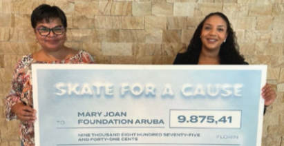 Renaissance Wind Creek Aruba team presenting a donation check to the Mary Joan Foundation.