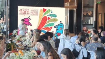 Chef Teddy Bouroncle preparing a Caribbean-inspired dish at Nam Santiago 2025.