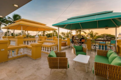 Guests enjoying the vibrant Carnival celebration at Horizons Lounge.