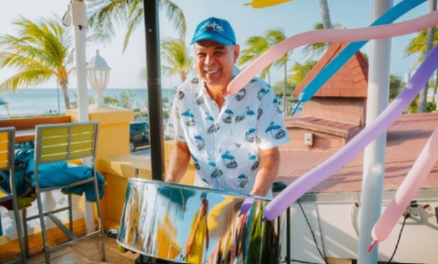 Guests enjoying comedy show at Amsterdam Manor Aruba for Day of Happiness