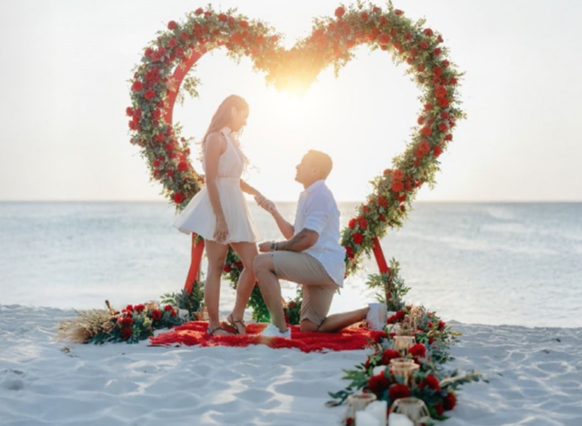 Romantic beachfront proposal setup at Amsterdam Manor Aruba