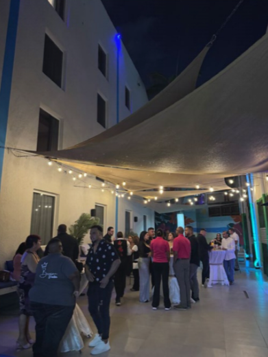 Antonio Marshall posing with TRYP Aruba ambassadors