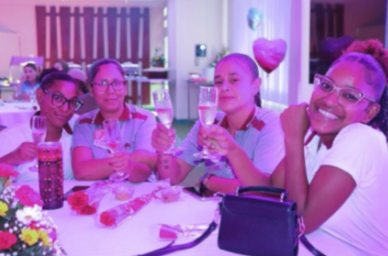 Mathilde Benito receiving Mother of the Year award at La Cabana Beach Resort Aruba