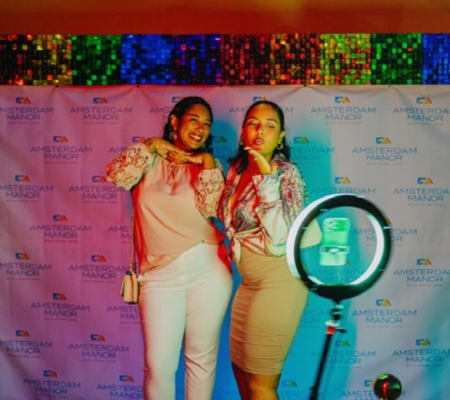 Guests celebrating Aruba Pride 2025 at Horizons Lounge with rainbow décor