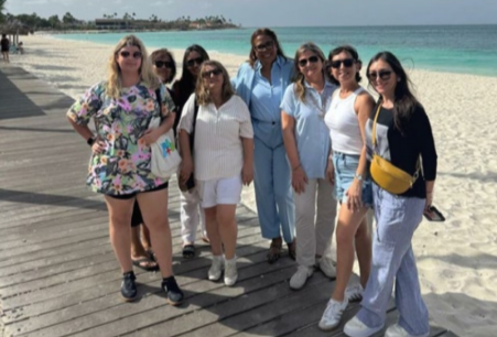 Travel advisors enjoying a catamaran cruise with Palm Pleasure during Aruba fam trip