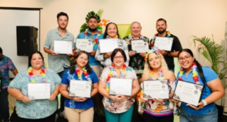 De Palm Tours employees celebrate milestones at Hawaiian-themed staff recognition event in June 2025