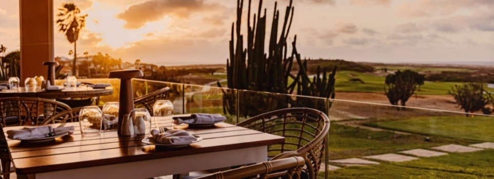 Guests enjoying a three-course Caribbean-inspired meal at The Birdie, Tierra del Sol, Aruba