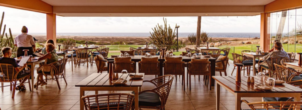 Chef-crafted Caribbean-inspired main course at The Birdie, Tierra del Sol