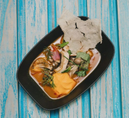 Chef Alejandro Camurri presenting Caribbean Fusion dishes at Marea during Autentico Aruba Culinary Festival 2025