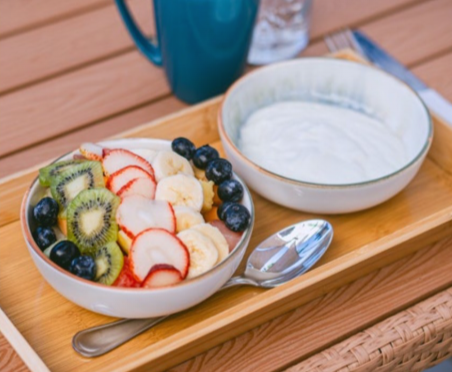Guests enjoying breakfast in the tropical courtyard