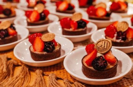 Local chefs presenting signature dishes at Mercat Aruba