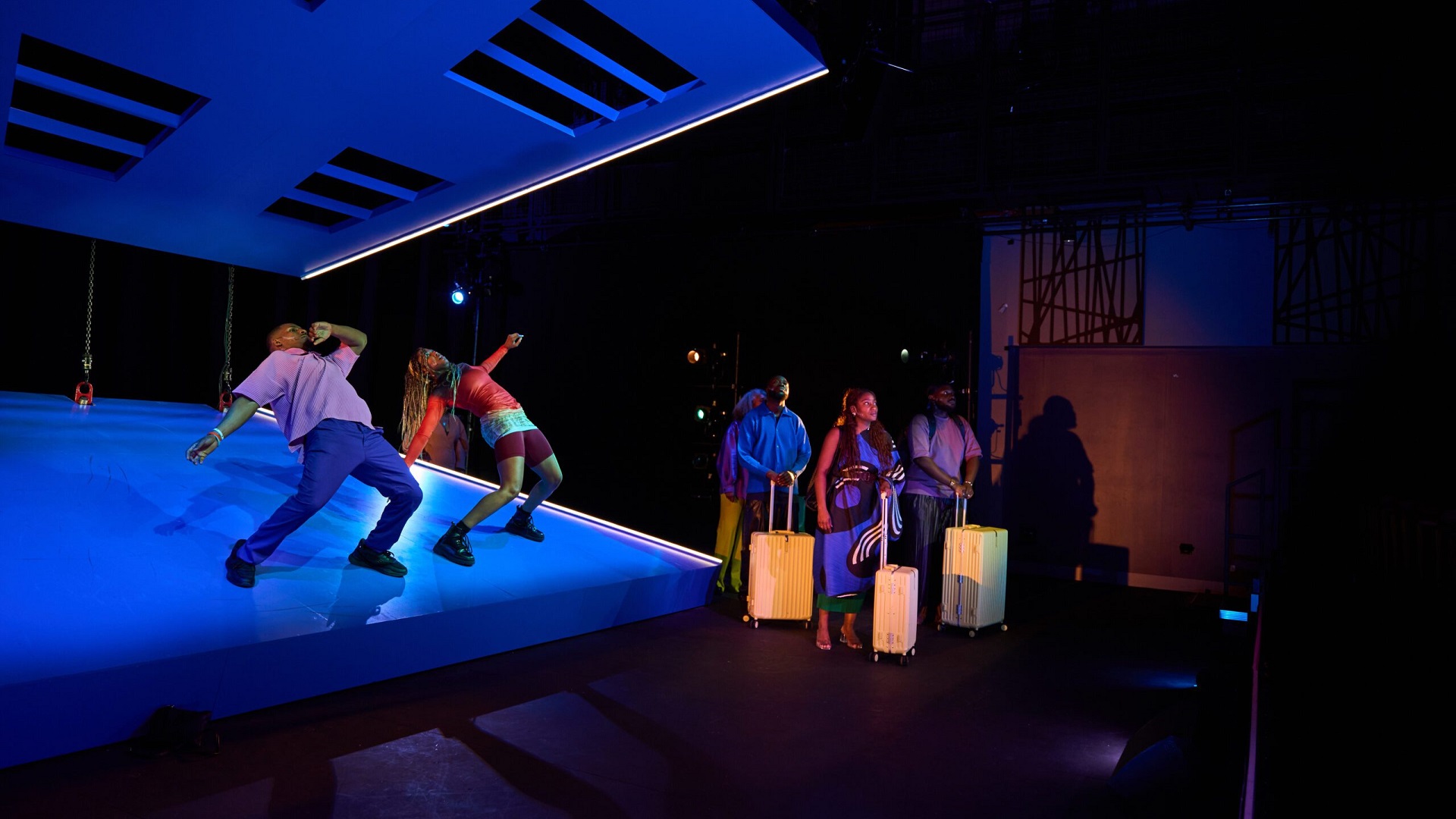 Performers acting dynamic scene about migration and identity in KINGS Come Home Aruba