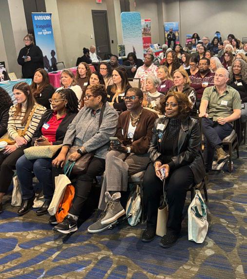 Travel advisors attending Aruba Tourism Authority presentation during Caribbean Village trade event